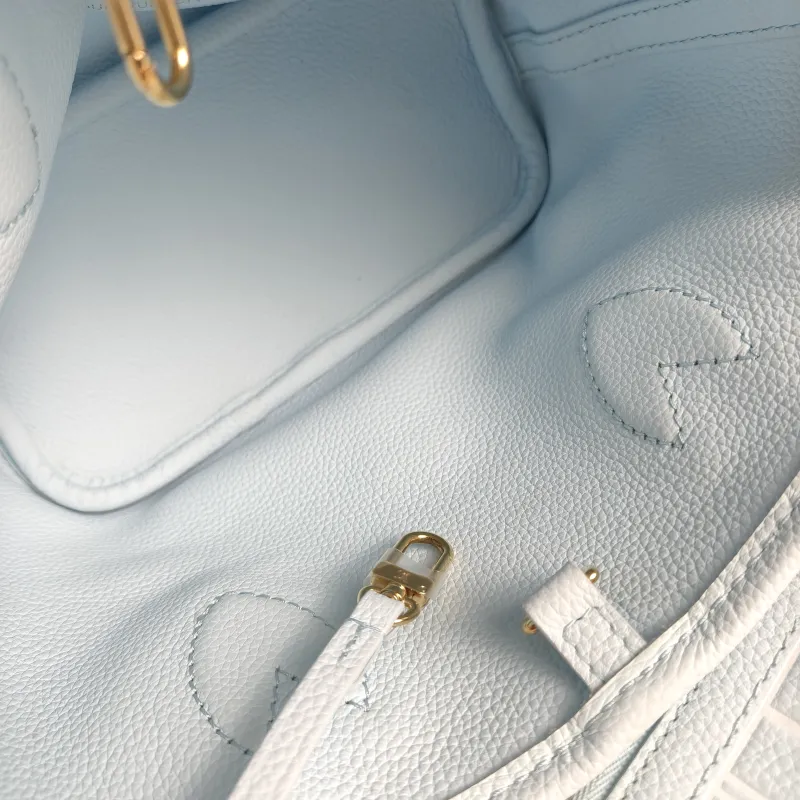 Louis Vuitton Crossbody Bag NEVERFULL INSIDE OUT BB Blue PVC · Calfskin BB 26.5 × 11 × 16.5 cm — detail view 10 of 13