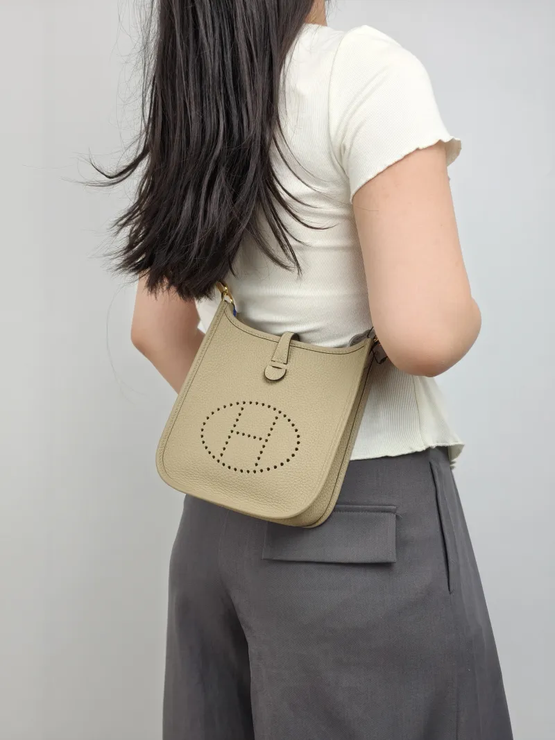 Hermès Crossbody Bag Evelyne Mini 16 Mini 16 S2 TC Calfskin Mini 17 × 5.5 × 18 cm K — on-model view 1 of 2