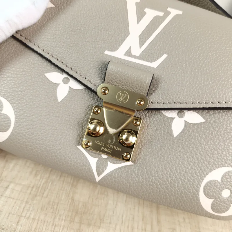 Louis Vuitton Crossbody Bag Pochette Métis East West Monogram Empreinte Embossed Calfskin Small 21.5 × 6 × 13.5 cm — detail view 7 of 13