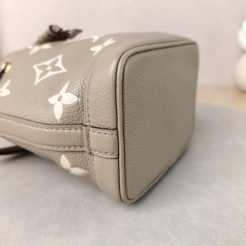 Louis Vuitton Crossbody Bag NANO NOÉ Bucket Bag Nano · White Monogram Empreinte Embossed Calfskin nano 13 × 10 × 16 cm — detail view 11 of 11