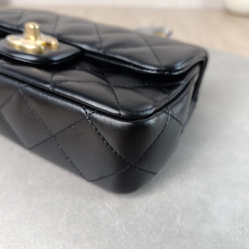 Chanel Crossbody Bag Black with Gold-Tone Hardware Lambskin Mini 18 × 5 × 12 cm — detail view 2 of 10