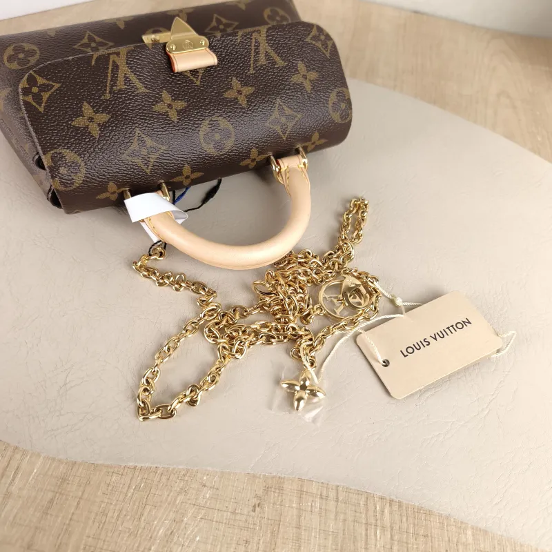 Louis Vuitton Crossbody Bag MADELEINE Monogram PVC nano 21 × 6 × 12.5 cm — detail view 2 of 13