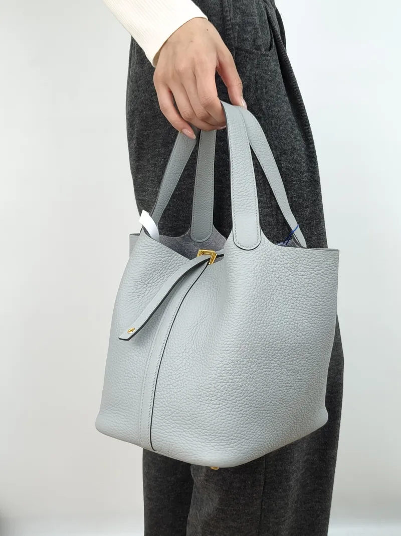Hermès Top Handle Bag Picotin Lock 22 228U Taurillon Clemence TC Calfskin Medium22 × 17 × 21 cm — on-model view 2 of 2