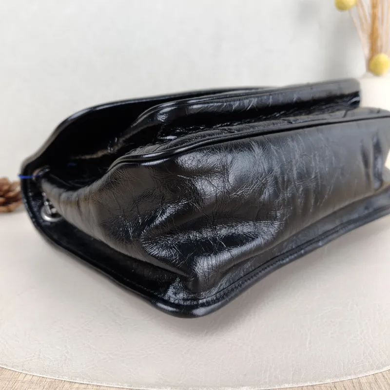 SAINT LAURENT Crossbody Bag Niki D Waxed Leather Calfskin Medium 28 × 8.5 × 20 cm — detail view 1 of 14