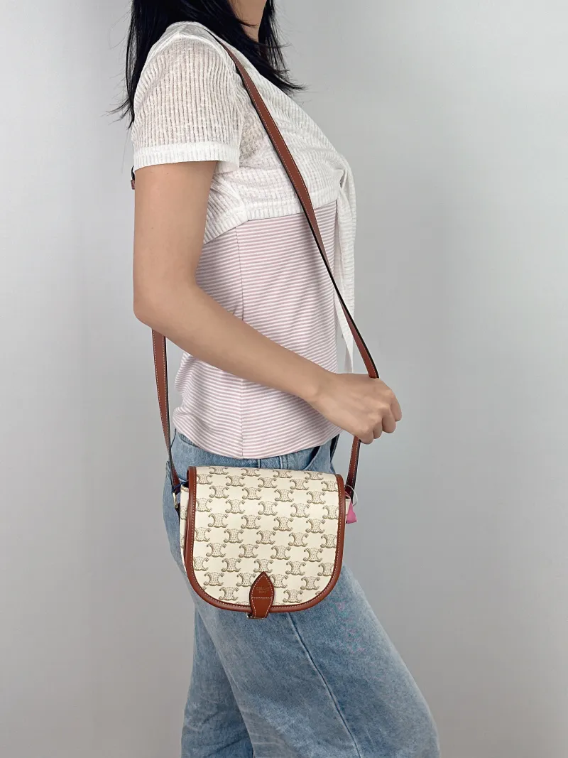 CELINE Crossbody Bag FOLCO White PVC Medium 18.5 × 8 × 17 cm — on-model view 1 of 2