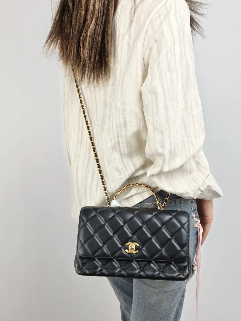 Chanel Crossbody Bag Black with Gold-Tone Hardware Lambskin One Size 25 × 10 × 16 cm — on-model view 2 of 2
