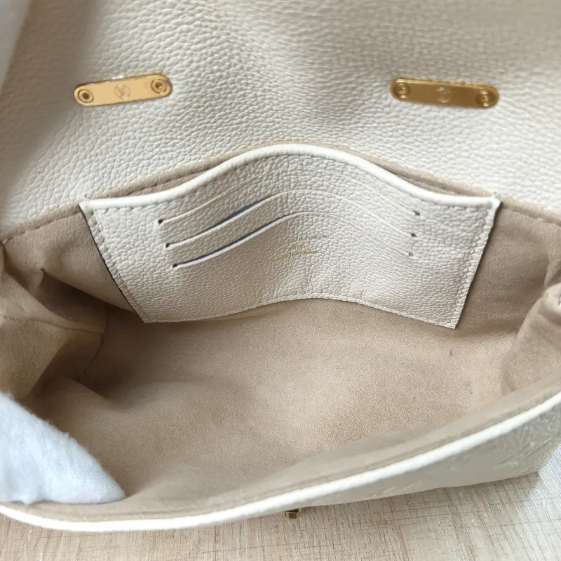Louis Vuitton Crossbody Bag MADELEINE White Empreinte Embossed Calfskin nano 21 × 6 × 12.5 cm — detail view 9 of 11