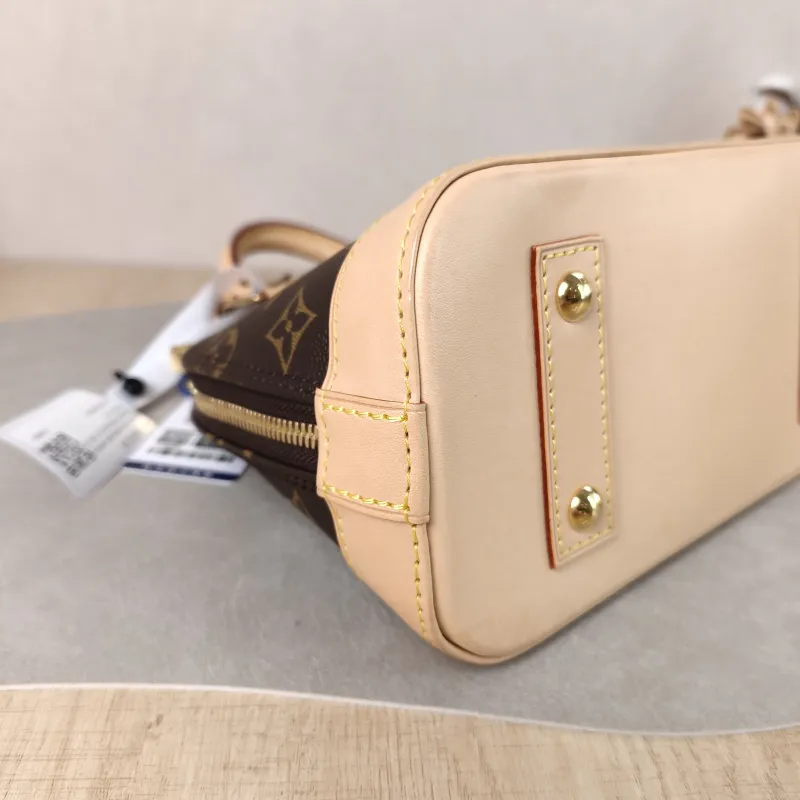 Louis Vuitton Crossbody Bag Alma BB Monogram PVC BB 23.5 × 11.5 × 17.5 cm — detail view 9 of 12