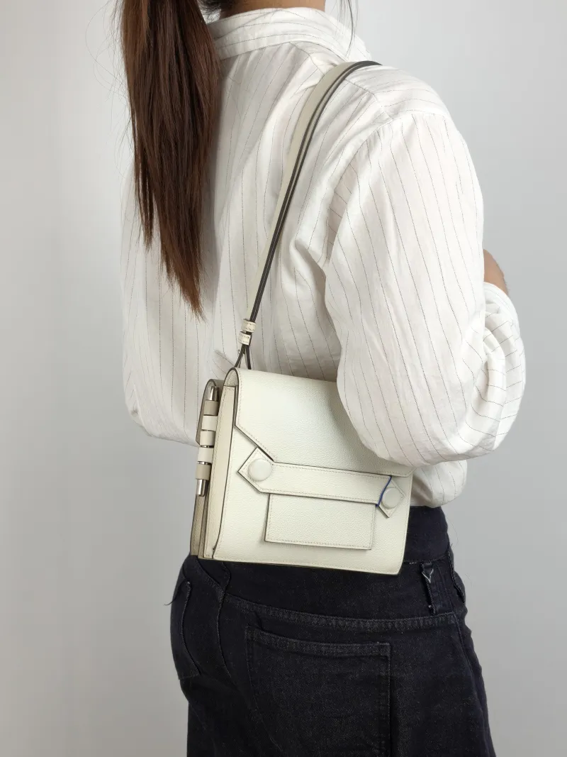 Hermès Crossbody Bag Twins 10 Evercolor Calfskin One Size 18 × 6 × 16 cm D — on-model view 1 of 2