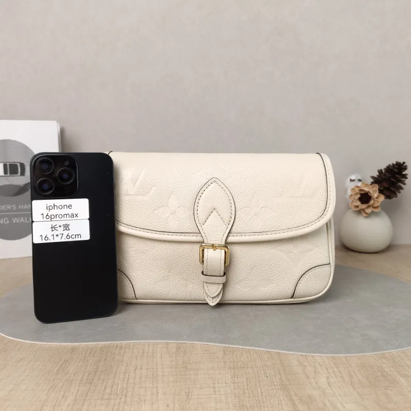 Louis Vuitton Crossbody Bag Diane Baguette Bag White Monogram Empreinte Embossed Calfskin Small 24 × 9 × 15 cm — cover view 6 of 6