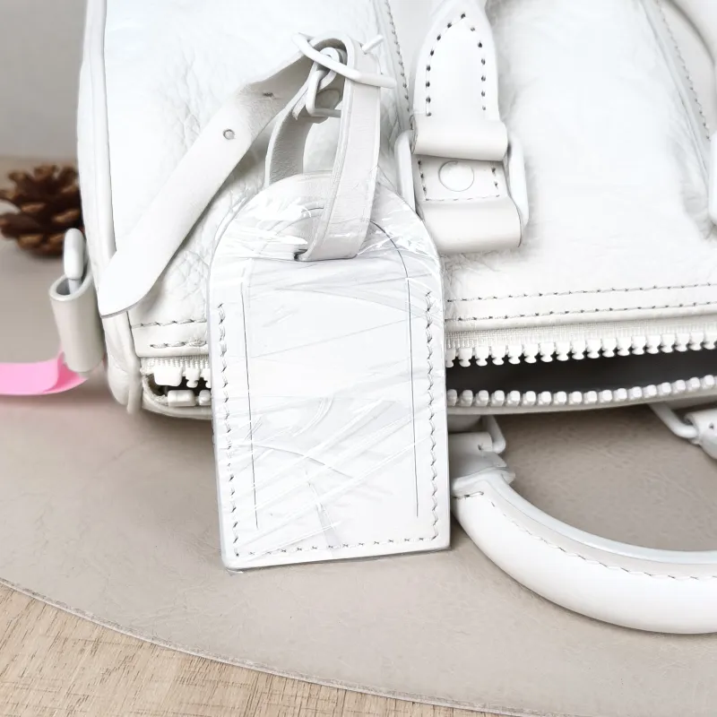 Louis Vuitton Crossbody Bag Keepall 25 White Calfskin Medium 25 × 11 × 15 cm — detail view 8 of 11