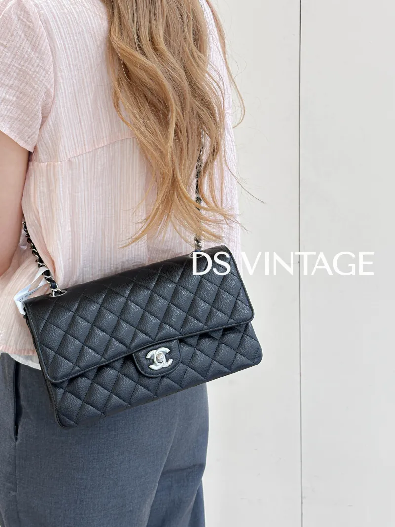 Chanel Crossbody Bag V Classic Flap CF Black Grained Calfskin Medium 25.5 × 6.5 × 15.5 cm 22 — on-model view 2 of 3