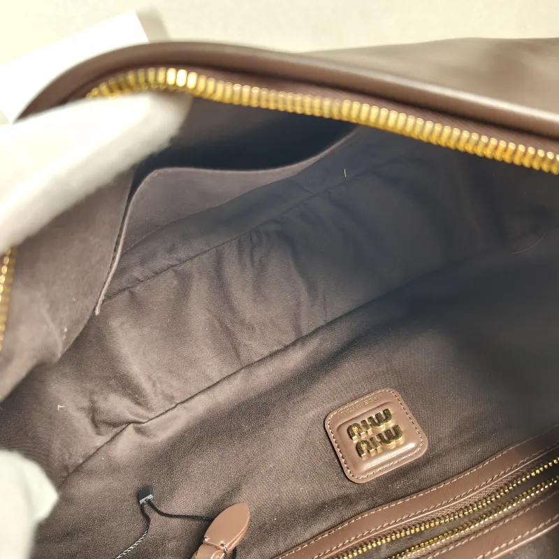 Miumiu Shoulder Bag Wander Collectionhobo Shoulder Bag Calfskin One Size 35 × 10 × 20 cm — detail view 1 of 10
