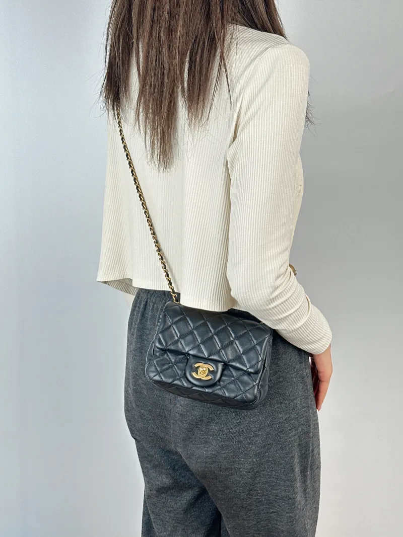 Chanel Crossbody Bag Black Lambskinmini17 × 8 × 13.5 cm — on-model view 1 of 3