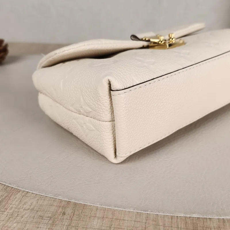 Louis Vuitton Crossbody Bag MADELEINE White Empreinte Embossed Calfskinnano21 × 6 × 12.5 cm — detail view 11 of 11