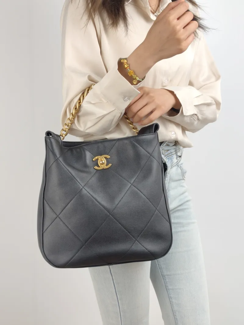 Chanel Shoulder Bag hobo Black Calfskin One Size 27 × 7 × 27 cm — on-model view 2 of 2