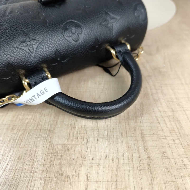 Louis Vuitton Crossbody Bag MADELEINE Black Monogram Empreinte Embossed Calfskin nano 21 × 6 × 12.5 cm — detail view 9 of 14
