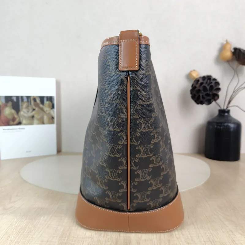 CELINE Crossbody Bag Triomphe Bucket Bag Monogram PVC Medium 24 × 18 × 27 cm — detail view 1 of 10