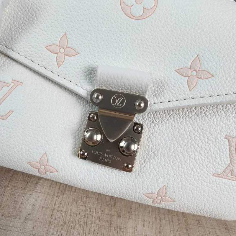 Louis Vuitton Crossbody Bag Pochette Métis East West White · Pink Monogram Empreinte Embossed Calfskin Small 21.5 × 6 × 13.5 cm — detail view 4 of 13