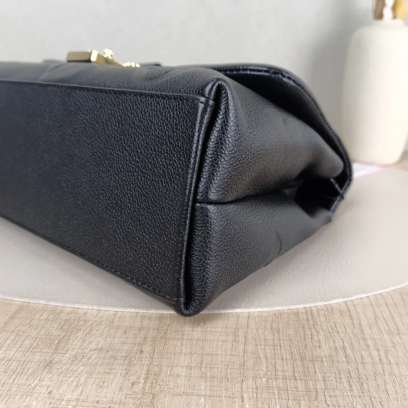 Louis Vuitton Crossbody Bag MADELEINE Black Monogram Empreinte Embossed Calfskin Medium 30 × 11 × 19.5 cm — detail view 3 of 13