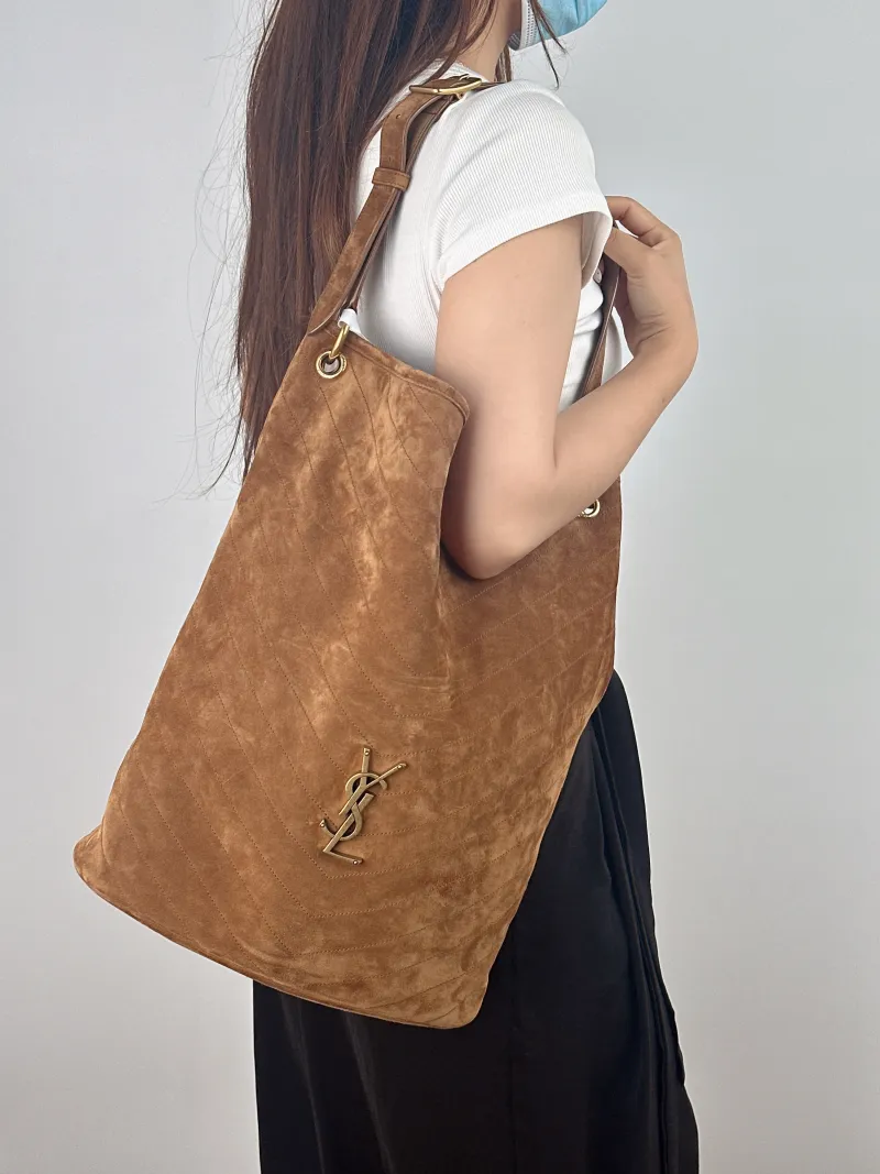 SAINT LAURENT Shoulder Bag Bucket Bag Brown Suede One Size 28 × 15 × 38 cm — on-model view 1 of 2
