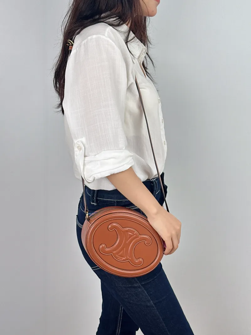 CELINE Crossbody Bag Cuir Triomphe Brown Calfskin Large 20 × 6 × 15 cm — on-model view 1 of 2