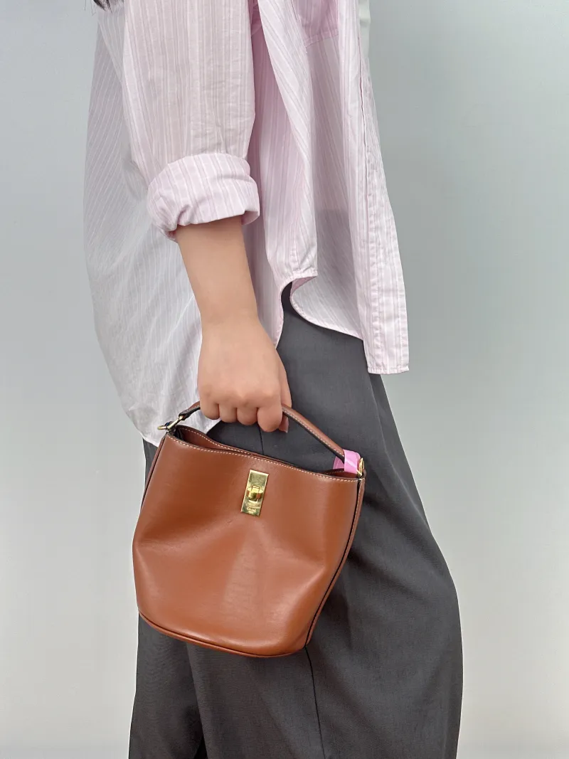 CELINE Crossbody Bag Bucket 16 Bucket Bag Caramel Calfskin Small 16 × 16 × 18 cm — on-model view 1 of 2