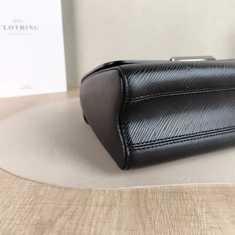 Louis Vuitton Crossbody Bag Twist Black Epi Embossed Calfskin Medium 23 × 9.5 × 17 cm — detail view 9 of 12