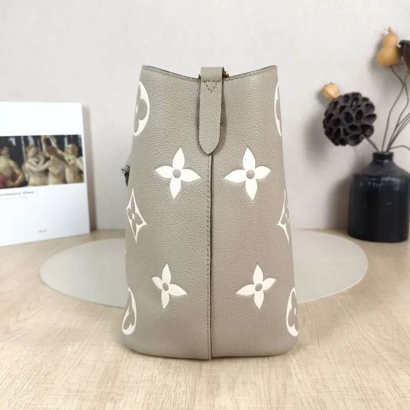 Louis Vuitton Shoulder Bag NÉONOÉ Bucket Bag · White Monogram Empreinte Embossed Calfskin Medium 26 × 17.5 × 26 cm — detail view 13 of 13