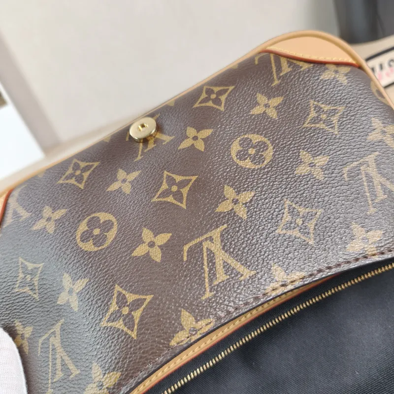 Louis Vuitton Crossbody Bag Diane Baguette Bag Shoulder Strap PVC Small 24 × 9 × 15 cm — detail view 1 of 13