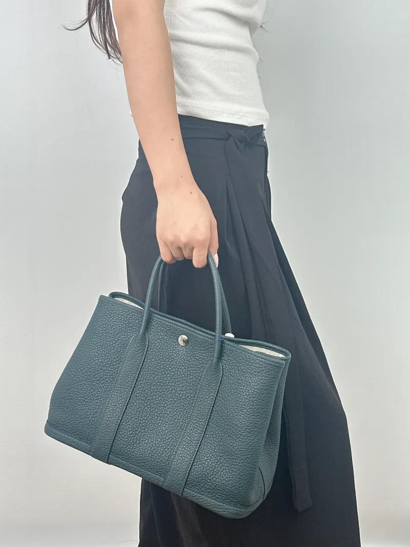Hermès Top Handle Bag Garden Party 30 30 Green Negonda Calfskin Medium 30 × 13 × 21 cm Z — on-model view 1 of 2