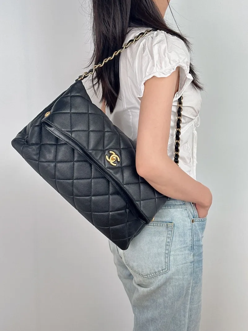 Chanel Shoulder Bag hobo Black Lambskin One Size 39 × 9 × 23 cm — on-model view 1 of 2