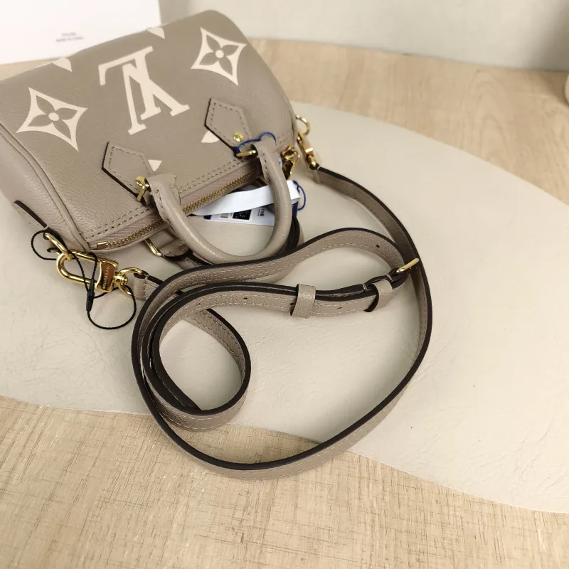 Louis Vuitton Crossbody Bag Speedy Nano · White Empreinte Embossed Calfskin Monogramnano16 × 7.5 × 10 cm — detail view 11 of 11