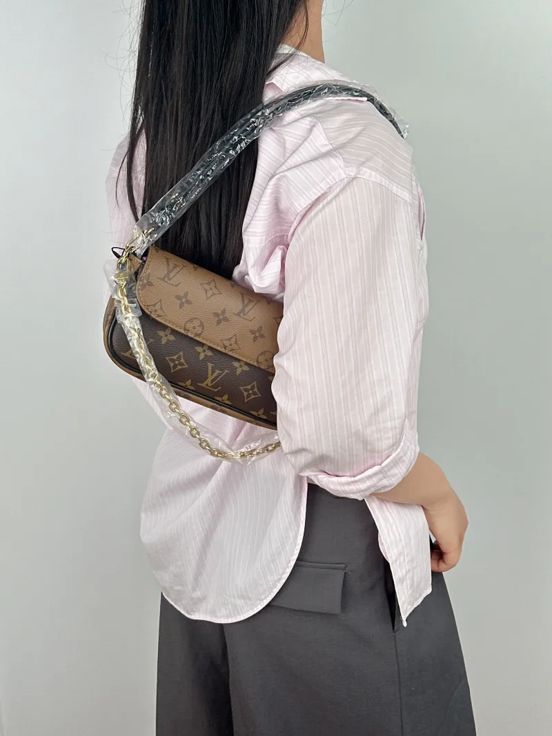 Louis Vuitton Crossbody Bag IVY Monogram PVC Small23.5 × 4.3 × 12 cm — on-model view 1 of 2