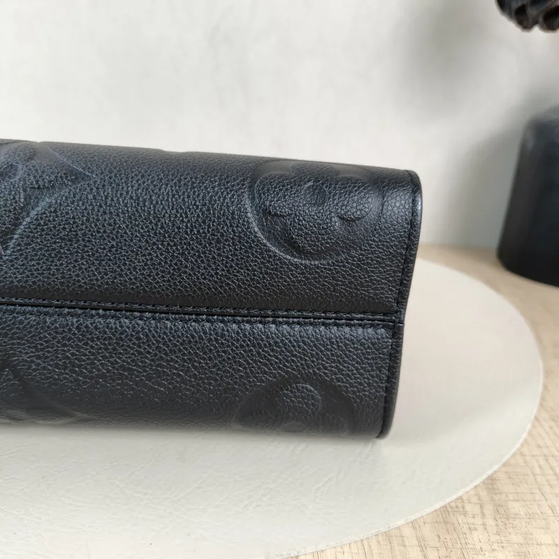 Louis Vuitton Crossbody Bag Onthego East West Two Straps Black Empreinte Embossed Calfskin Small 25 × 10 × 13 cm — detail view 5 of 12
