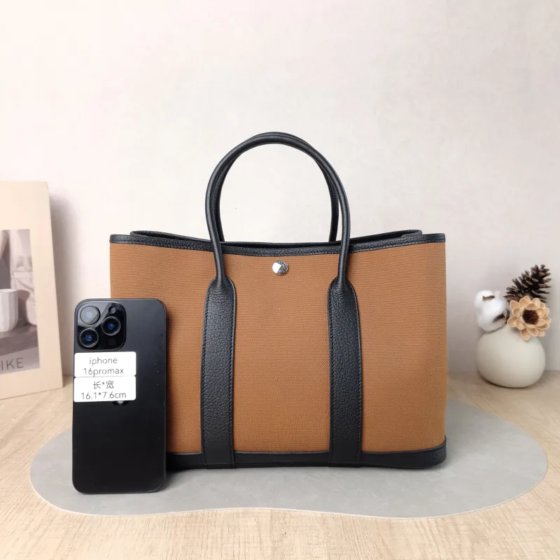 Hermès Top Handle Bag Garden Party 30 30 Brown Canvas · Negonda Calfskin Medium 30 × 13 × 21 cm B — cover view 2 of 5
