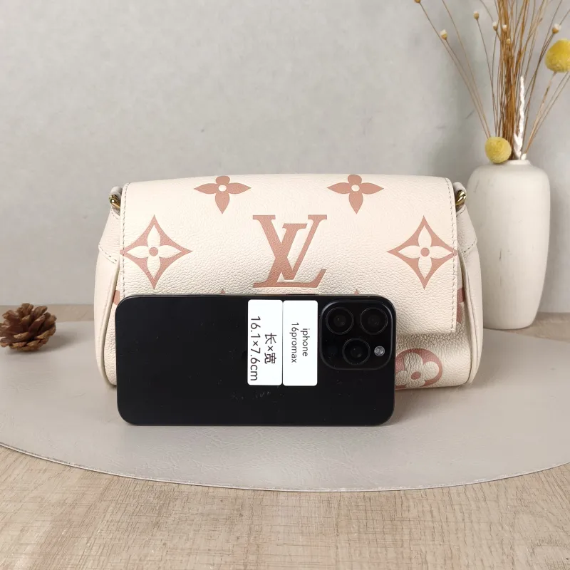 Louis Vuitton Crossbody Bag Favorite White · Pink Empreinte Embossed Calfskin Monogram Medium24 × 9 × 14 cm — cover view 2 of 5