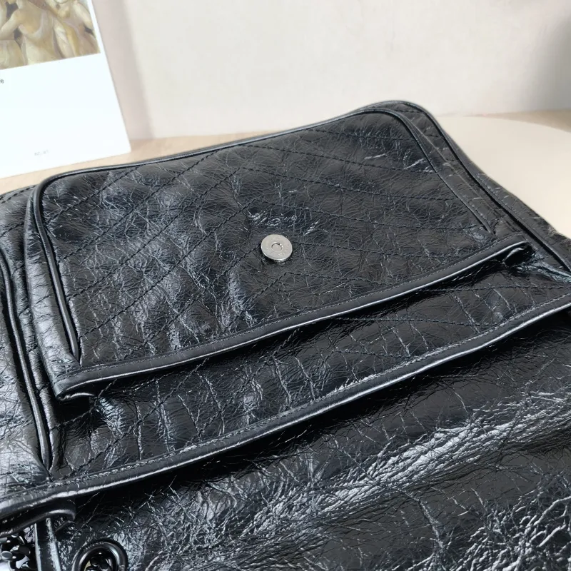 SAINT LAURENT Crossbody Bag Niki Black Waxed Leather Calfskin Large 32 × 9 × 23 cm — detail view 9 of 14