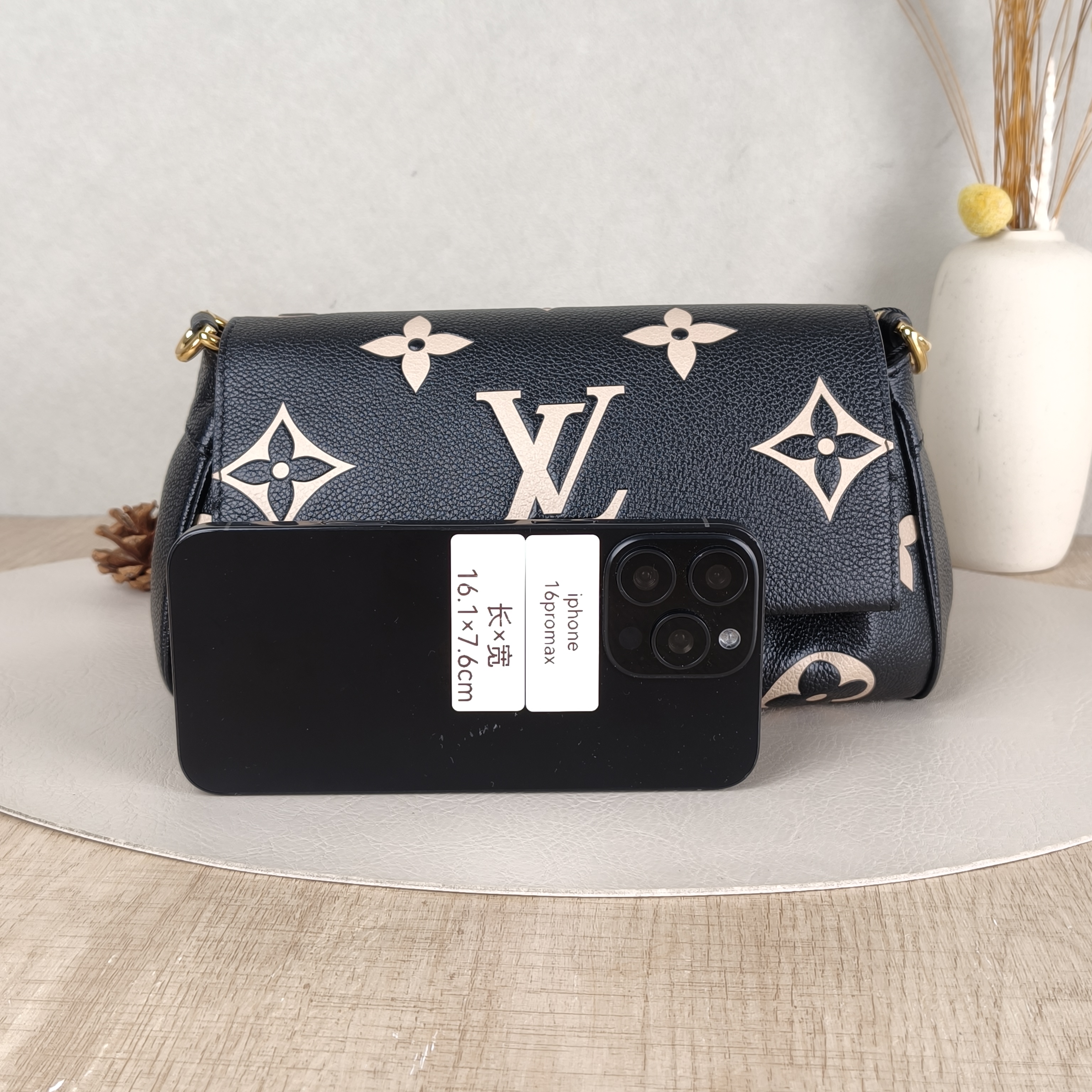 Louis Vuitton Crossbody Bag Favorite Black · White Empreinte Embossed Calfskin Monogram Medium24 × 9 × 14 cm — cover view 3 of 5