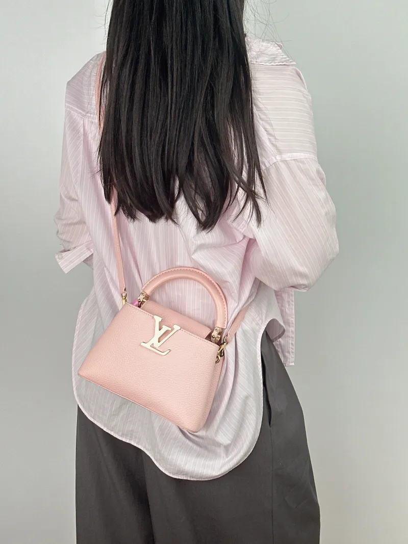 Louis Vuitton Shoulder Bag Capucines Pink Calfskin Mini 21 × 8 × 14 cm — on-model view 2 of 2