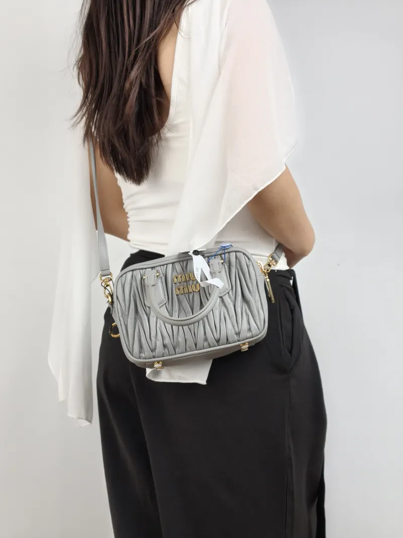 Miumiu Top Handle Bag Arcadie MatelasséCollection Edition Grey Lambskin Small 19 × 6 × 13 cm — on-model view 1 of 2