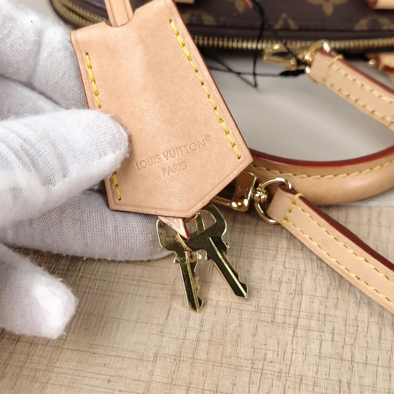 Louis Vuitton Crossbody Bag Alma BB Monogram PVCBB23.5 × 11.5 × 17.5 cm — detail view 7 of 14