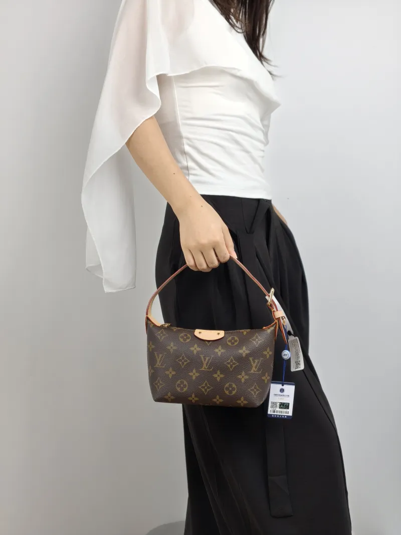 Louis Vuitton Shoulder Bag Pochette Hills Monogram PVC One Size 18.5 × 6.5 × 11 cm — on-model view 1 of 2