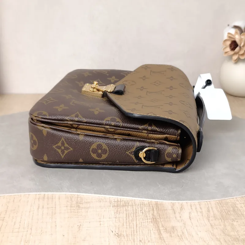 Louis Vuitton Crossbody Bag Pochette Métis Monogram Colorblock PVC Medium 25 × 7 × 19 cm — detail view 13 of 14