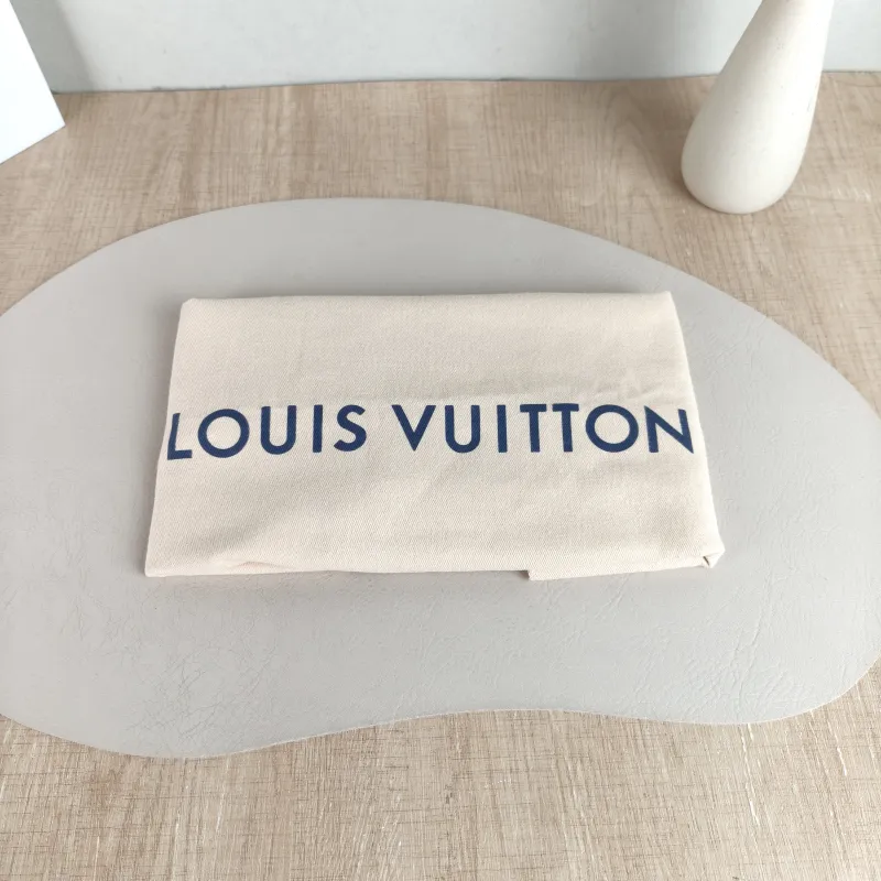 Louis Vuitton Crossbody Bag Favorite White · Pink Empreinte Embossed Calfskin Medium 24 × 9 × 14 cm — detail view 10 of 11