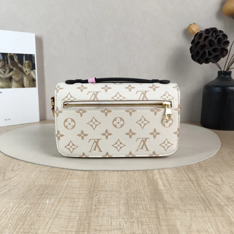 Louis Vuitton Crossbody Bag Pochette Métis East West PVC Small 21.5 × 6 × 13.5 cm — cover view 2 of 6