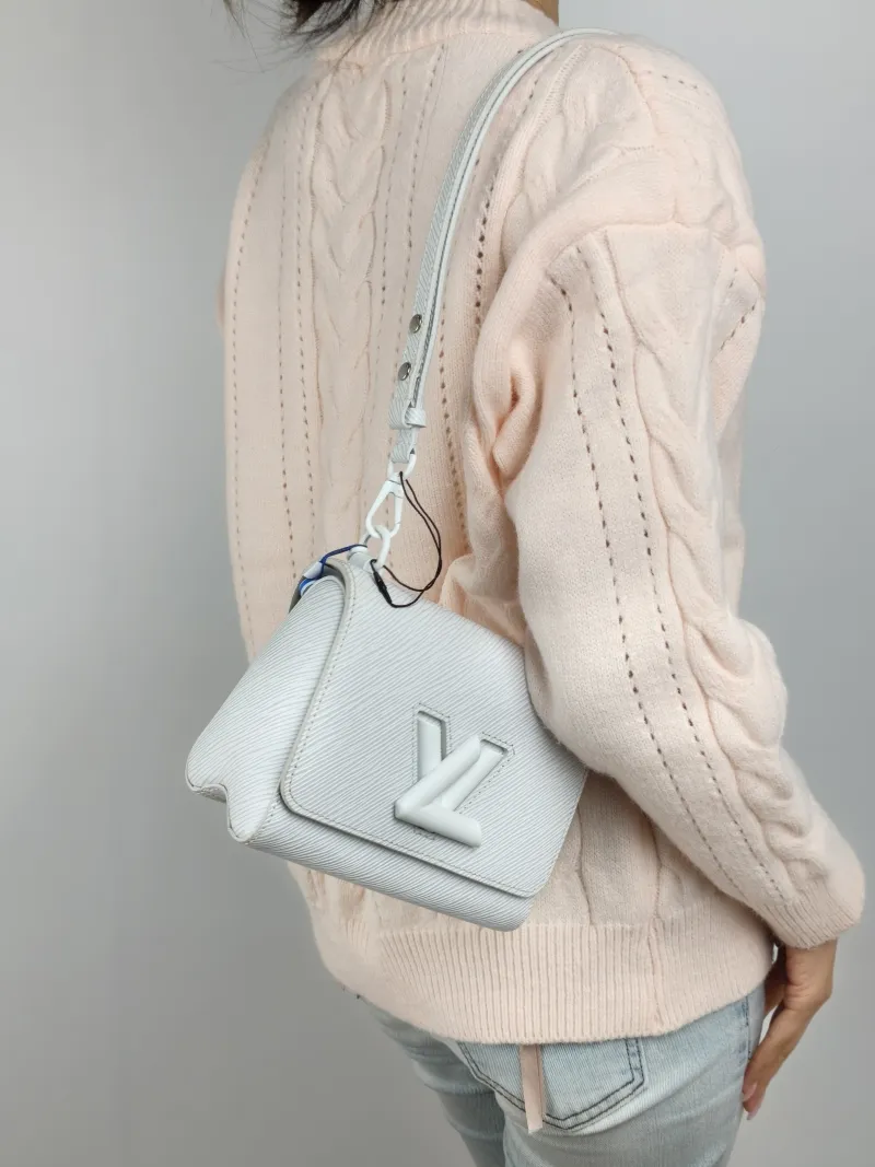 Louis Vuitton Crossbody Bag Twist White Epi Embossed Calfskin Small 19 × 9 × 15 cm — on-model view 2 of 3
