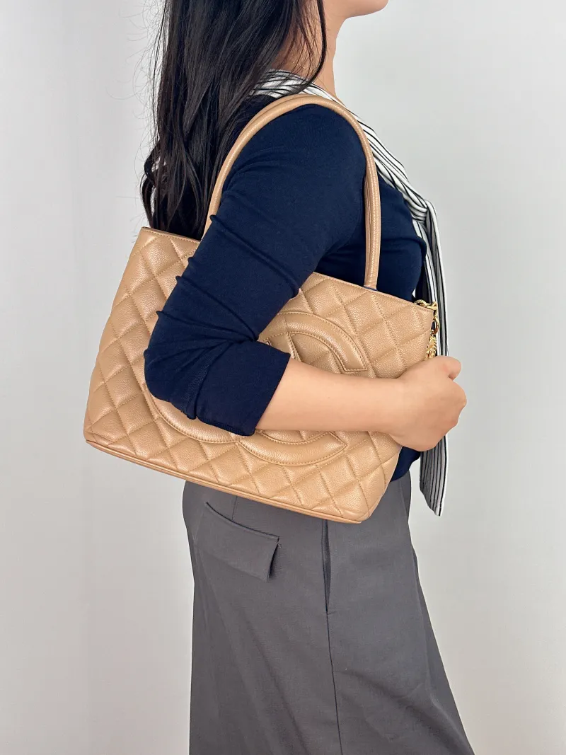 Chanel Top Handle Bag Medallion Taupe Grained Calfskin Large 30 × 15 × 24 cm 7 — on-model view 1 of 2