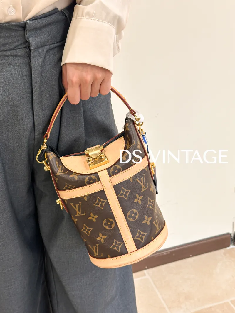 Louis Vuitton Crossbody Bag DUFFLE Monogram PVC22 × 14 × 23 cm — on-model view 1 of 3