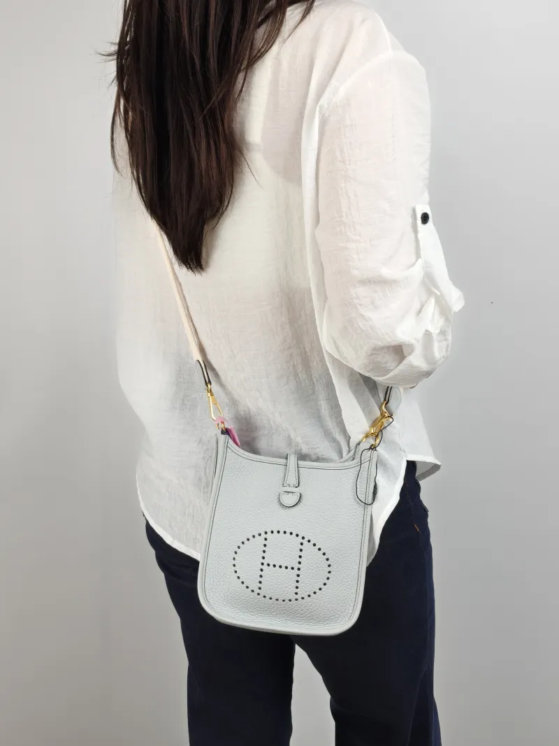 Hermès Crossbody Bag Evelyne Mini 16 Mini 16 TC Calfskin Mini 17 × 5.5 × 18 cm u Shoulder Strap — on-model view 1 of 2